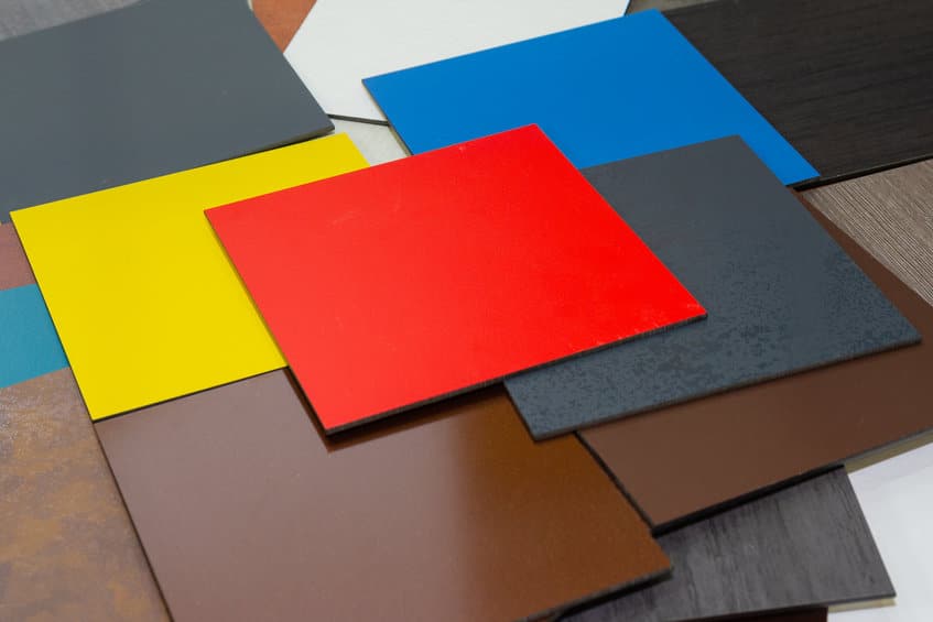 Multi-colored samples of composite materials for the ventilated facades in showroom. Construction